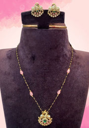 Beautiful short necklace with green stone with black beads